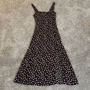 Black maxi dress with floral pattern & slit